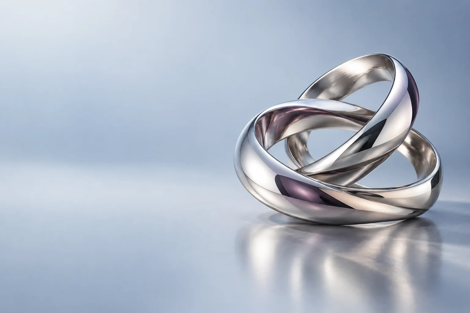 Digital concept study of interlocking sculptural silver bands